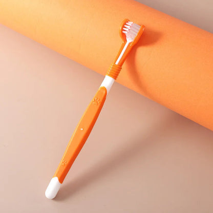 Orange toothbrush with white bristles on a beige background