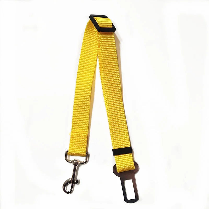 Adjustable nylon pet car seat belt safety leash for dogs and cats with quick-release buckle, helping keep pets secure and comfortable during car travel.