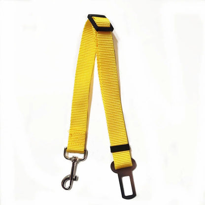 Adjustable nylon pet car seat belt safety leash for dogs and cats with quick-release buckle, helping keep pets secure and comfortable during car travel.