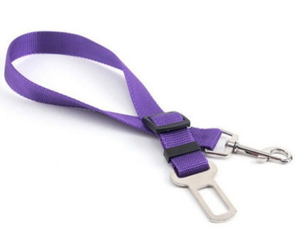 Adjustable nylon pet car seat belt safety leash for dogs and cats with quick-release buckle, helping keep pets secure and comfortable during car travel.