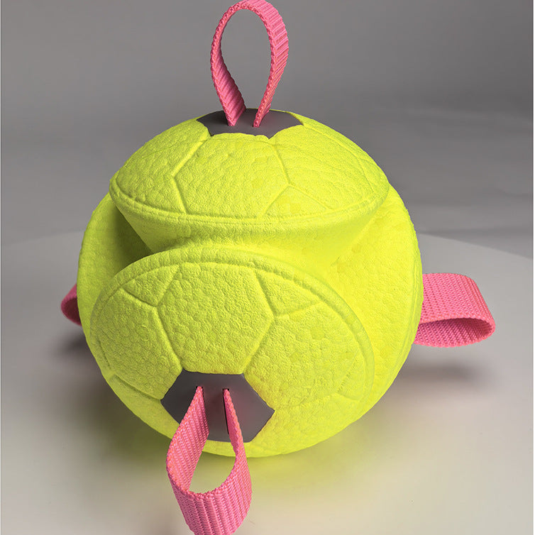 Yellow ball with pink handles on a gray background